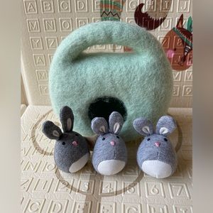 LOVEVERY Bunnies in a felt burrow.